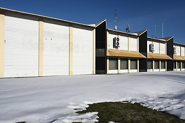 Image showing abandoned non residential building in winter, deadpan photograph