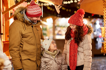 Image showing happy family at christmas market in city