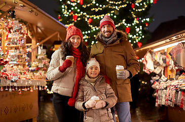 Image showing family with takeaway drinks at christmas market