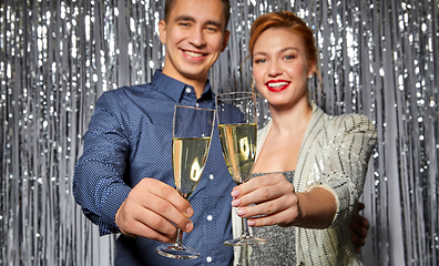 Image showing couple with champagne glasses at christmas party