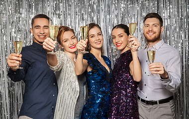 Image showing happy friends toasting champagne glasses at party