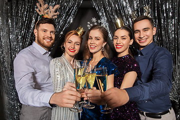 Image showing friends with champagne glasses at christmas party