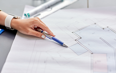 Image showing architect with blueprint working at office