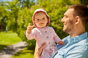 Image showing happy father with baby daughter at summer park