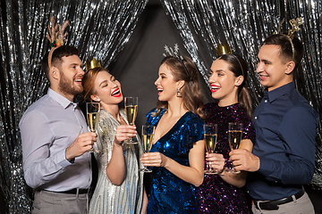 Image showing friends with champagne glasses at christmas party