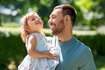 Image showing happy father with baby daughter at summer park