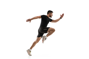 Image showing Caucasian professional sportsman training isolated on white studio background. Muscular, sportive man practicing.