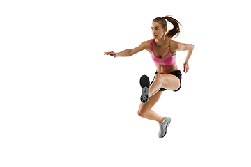 Image showing Caucasian professional female runner, athlete training isolated on white studio background. Copyspace for ad.