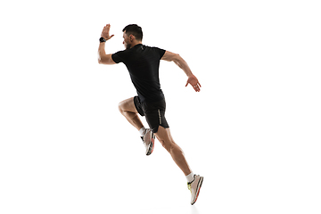 Image showing Caucasian professional sportsman training isolated on white studio background. Muscular, sportive man practicing.