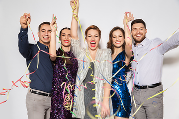 Image showing friends throwing party streamers and having fun