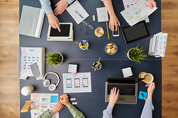 Image showing business team with gadgets working at office table