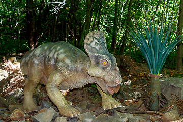 Image showing baby of prehistoric dinosaur in nature