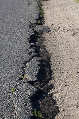 Image showing Broken asphalt