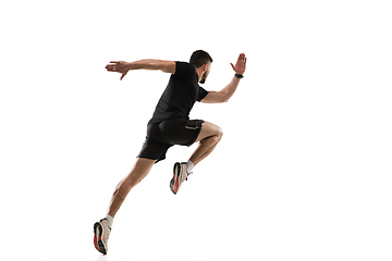 Image showing Caucasian professional sportsman training isolated on white studio background. Muscular, sportive man practicing.