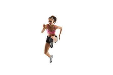 Image showing Caucasian professional female runner, athlete training isolated on white studio background. Copyspace for ad.
