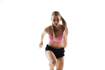 Image showing Caucasian professional female runner, athlete training isolated on white studio background. Copyspace for ad.