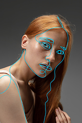 Image showing Art portrait of young woman, fashion model with abstract geometrical drawings by modern one line style technique