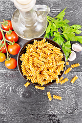 Image showing Fusilli whole grain in bowl with vegetables on black board top