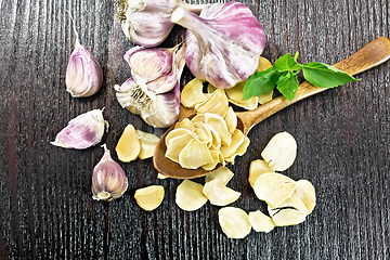 Image showing Garlic dried in spoon on board top