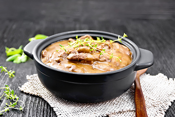 Image showing Goulash of beef in pan on black board