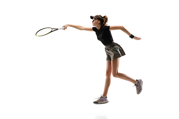 Image showing Young caucasian professional sportswoman playing tennis isolated on white background