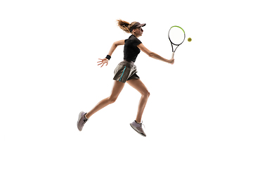 Image showing Young caucasian professional sportswoman playing tennis isolated on white background