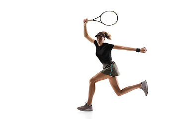 Image showing Young caucasian professional sportswoman playing tennis isolated on white background