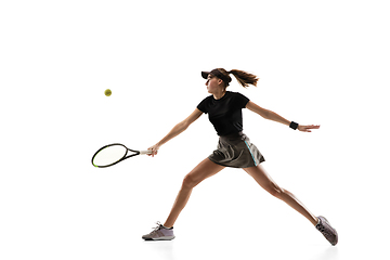 Image showing Young caucasian professional sportswoman playing tennis isolated on white background