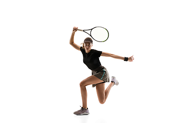 Image showing Young caucasian professional sportswoman playing tennis isolated on white background