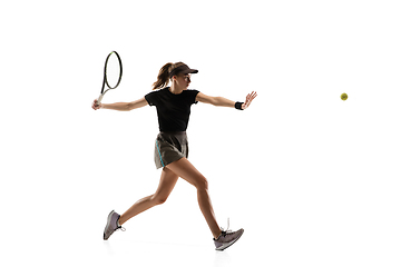 Image showing Young caucasian professional sportswoman playing tennis isolated on white background