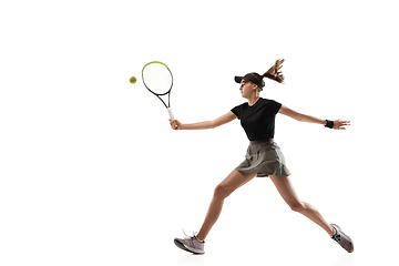 Image showing Young caucasian professional sportswoman playing tennis isolated on white background