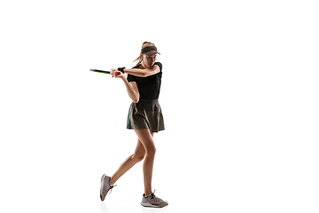 Image showing Young caucasian professional sportswoman playing tennis isolated on white background