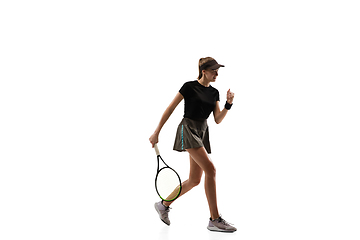 Image showing Young caucasian professional sportswoman playing tennis isolated on white background