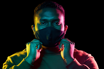 Image showing african american man wearing black reusable mask