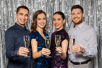 Image showing happy friends toasting champagne glasses at party