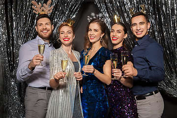 Image showing friends with champagne glasses at christmas party