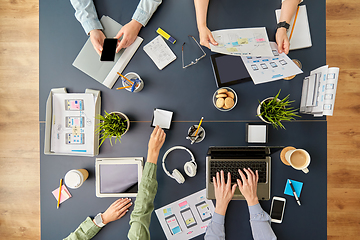 Image showing business team with gadgets working at office table