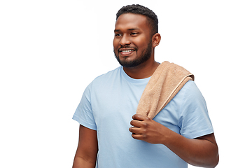 Image showing smiling african american young man with bath towel