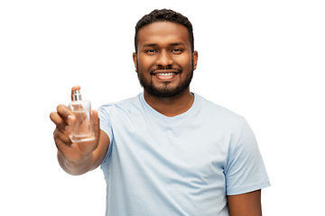 Image showing happy african american man with perfume