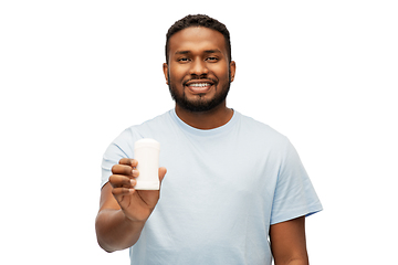 Image showing african american man with antiperspirant deodorant