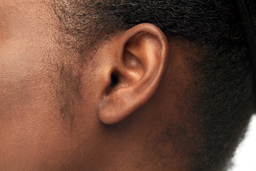 Image showing close up of african american woman's ear