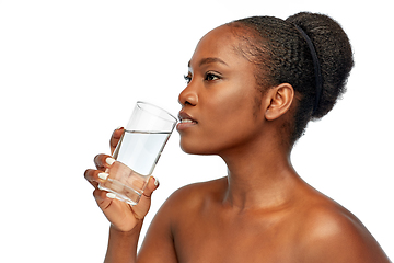 Image showing young african american woman with glass of water
