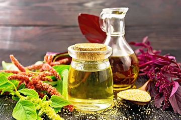 Image showing Oil amaranth in jar on table