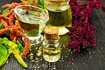 Image showing Oil amaranth in vial on board