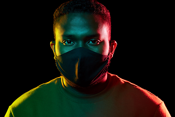 Image showing african american man wearing black reusable mask