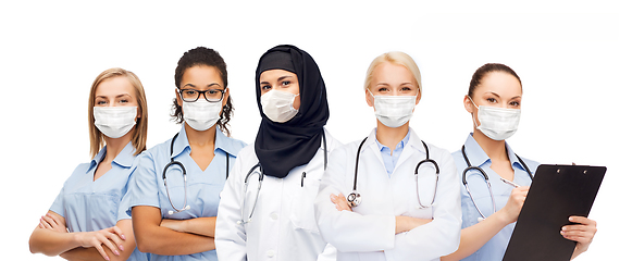 Image showing group of female doctors in masks with stethoscopes