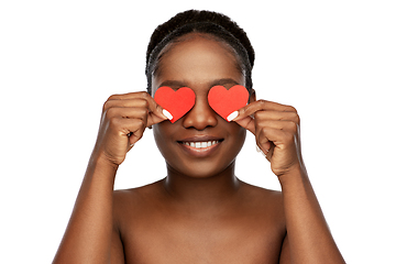 Image showing smiling african american woman with red hearts