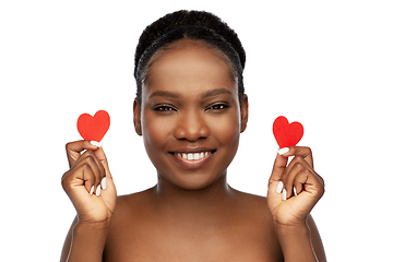 Image showing smiling african american woman with red hearts