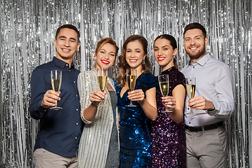 Image showing happy friends toasting champagne glasses at party