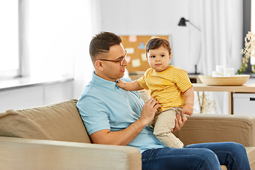 Image showing happy father with little baby son at home